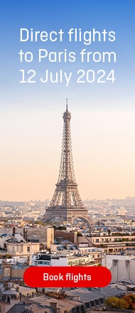 Eiffel Tower in Paris, reads direct flights to Paris from July