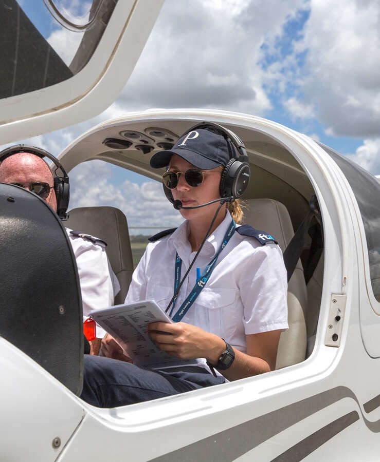 Aircraft with pilot in cockpit