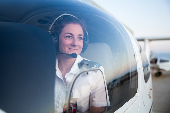 Female pilot in cockpit