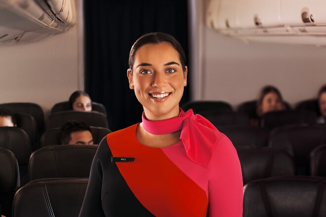 Flight attendant in 737 Economy cabin