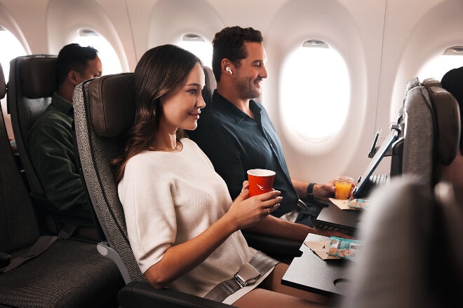 Passengers in cabin on QantasLink flight