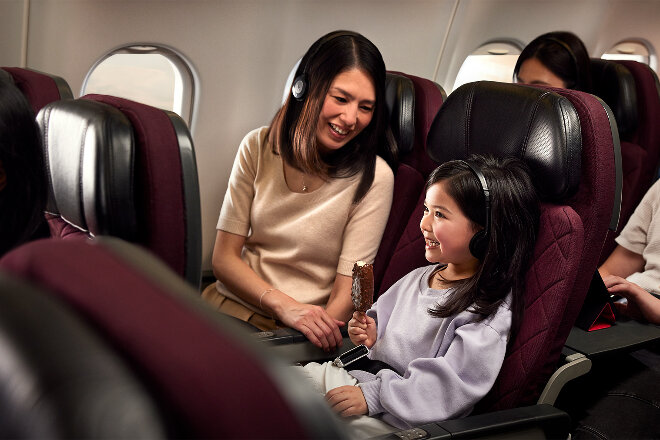 Mother and daughter enjoying entertainment