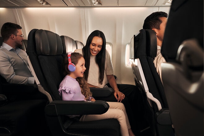 Mother and daughter in Economy