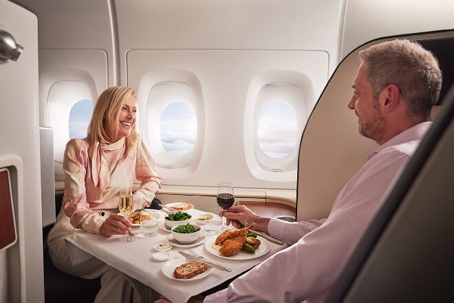 Man and women dining in suite