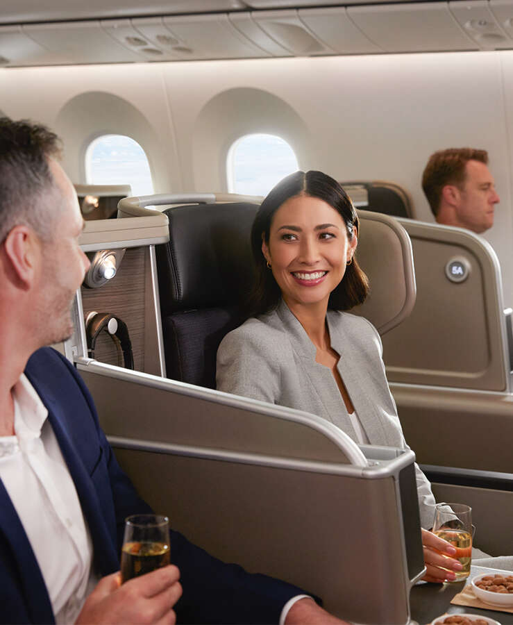 Couple sitting in the business cabin