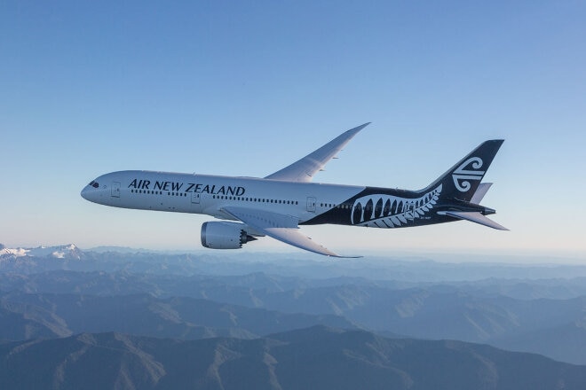 Air New Zealand aircraft flying over mountainous land