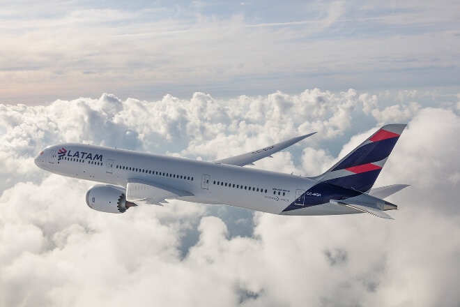 LATAM aircraft flying over clouds