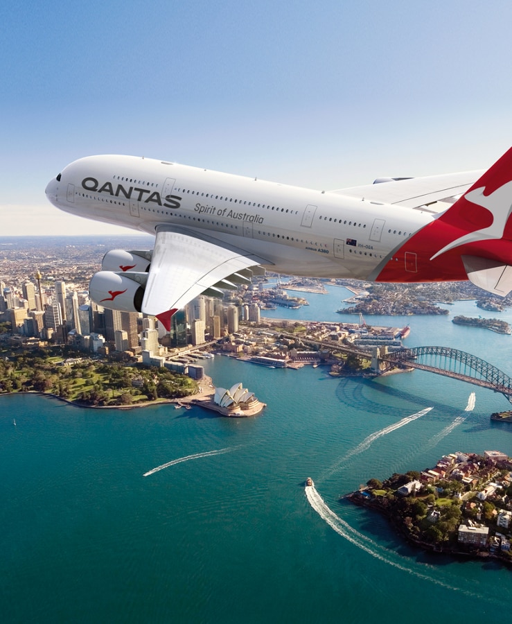 Qantas A380 flying across Sydney Harbour