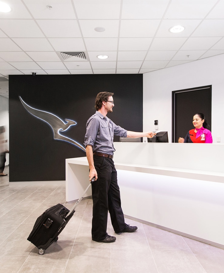 man entering qantas club