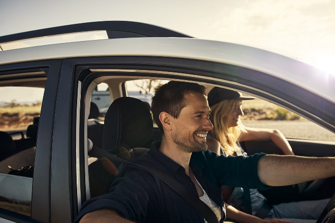 Couple in a car driving