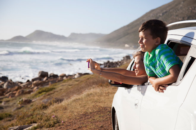 Kids enjoying view from car window