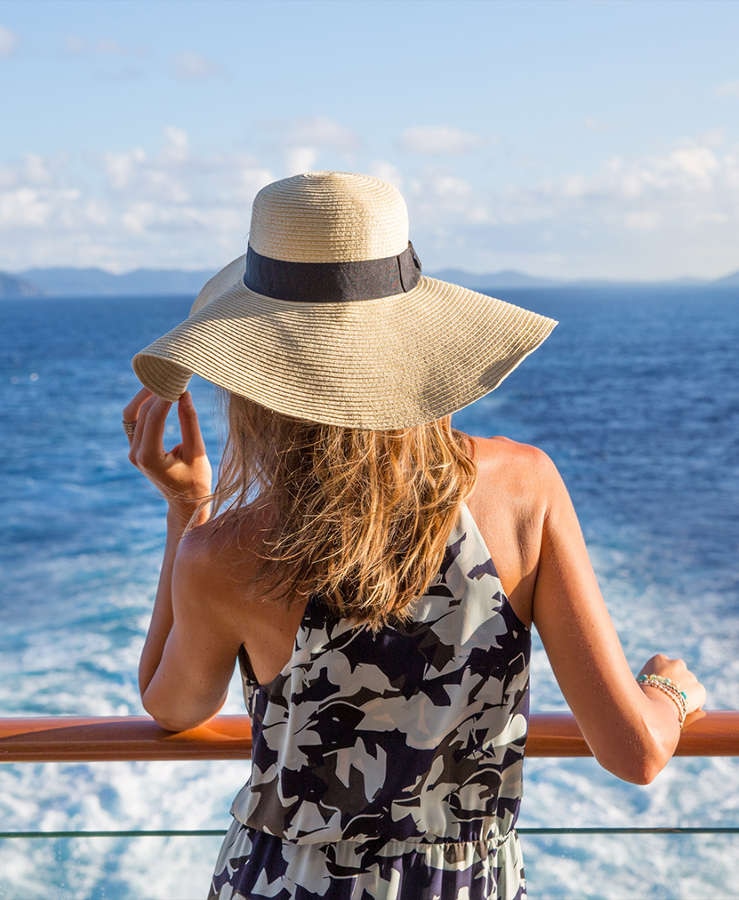 Lady at the back of a cruise ship