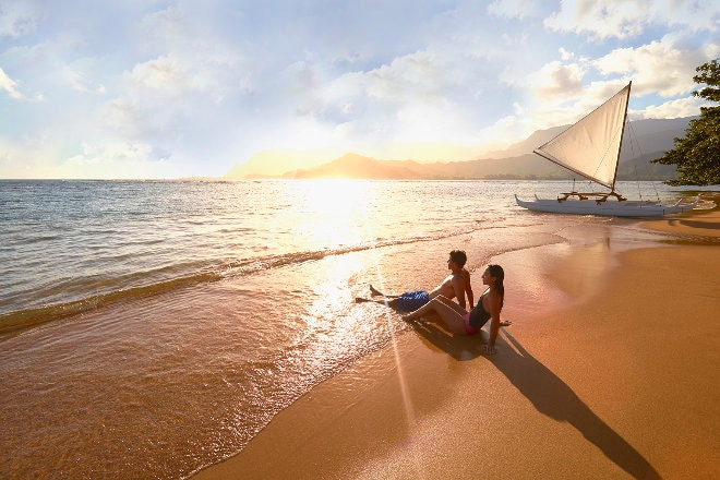 Couple sitting on the beach