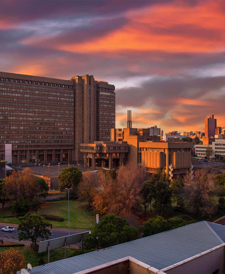 Sunset View of City Council Building and Hillbrow Tower (JG Strijdom Tower), Johannesburg, Gauteng, South Africa 