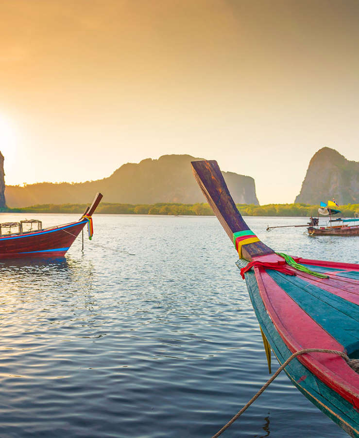 Longtail boats and sea