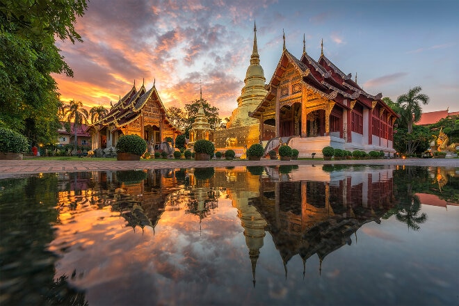 Temples reflected in water at Chiang Mai