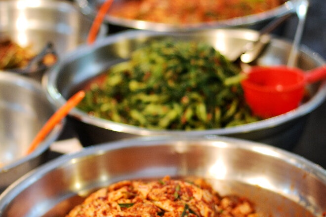 Bowls of kimchi at a market