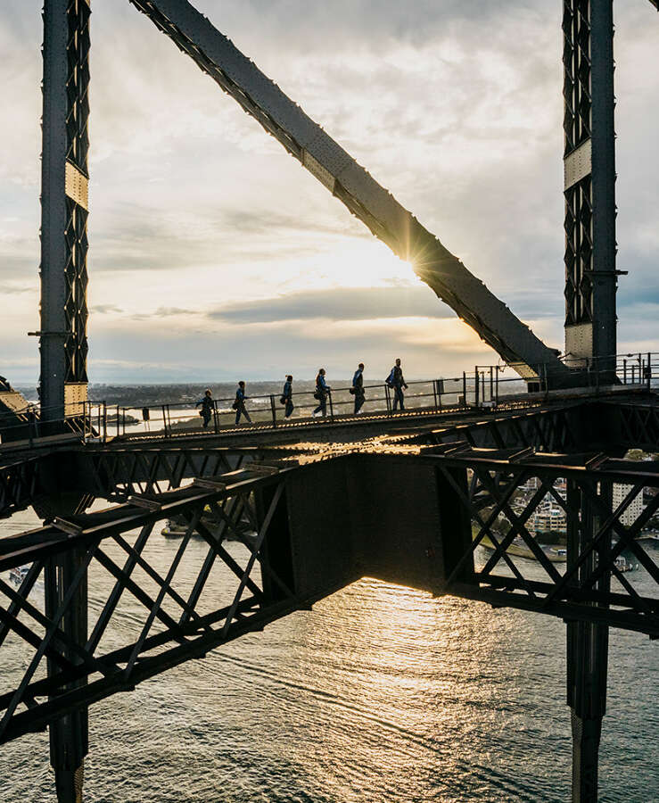 People climbing Sydney Harbour Bridge