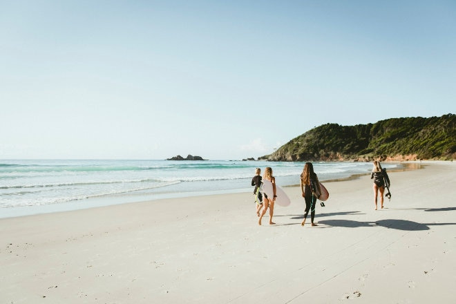 Surfers on Broken Head Beach, Byron Bay