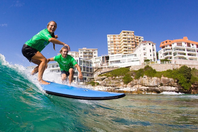 two people surfing at bondi