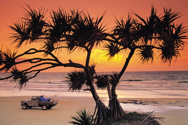 4-wheel drive on beach at sunset