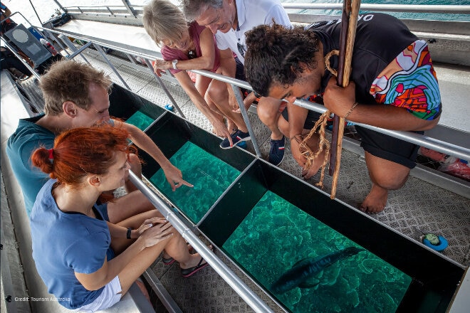 People onboard the Tribal Warrior Sydney harbour cruise