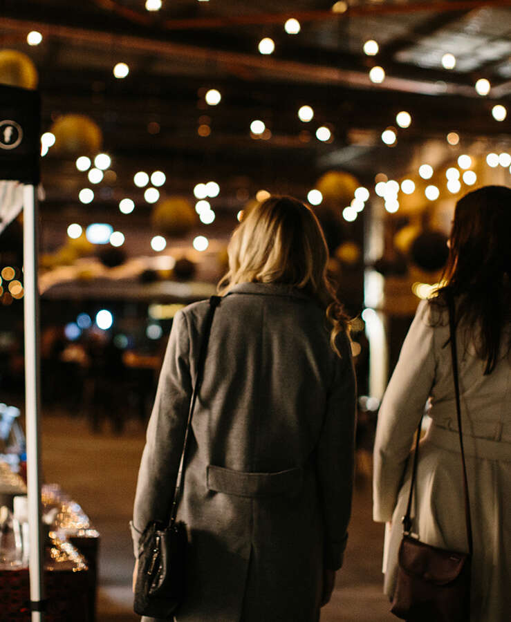 Friday night market with people shopping at Providore