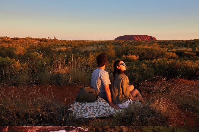 Couple having a picnic at Uluru