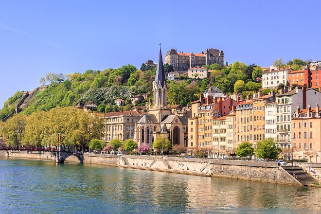 Buildings by river in Lyon