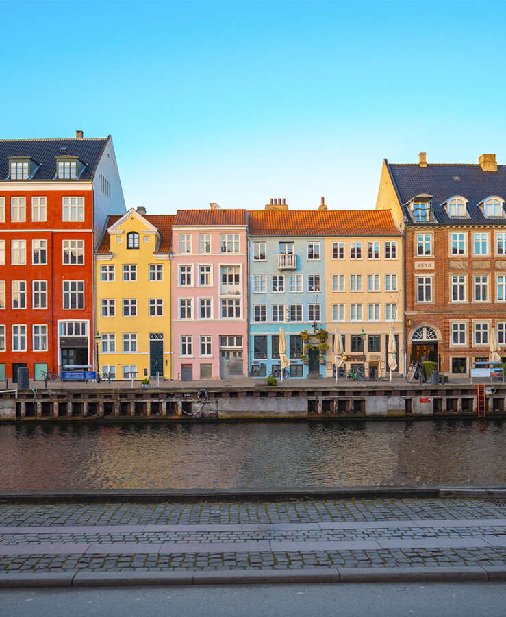 Colorful vibrant houses at Nyhavn harbor in Copenhagen, Denmark