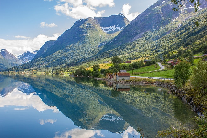 Norwegian hills reflecting in water