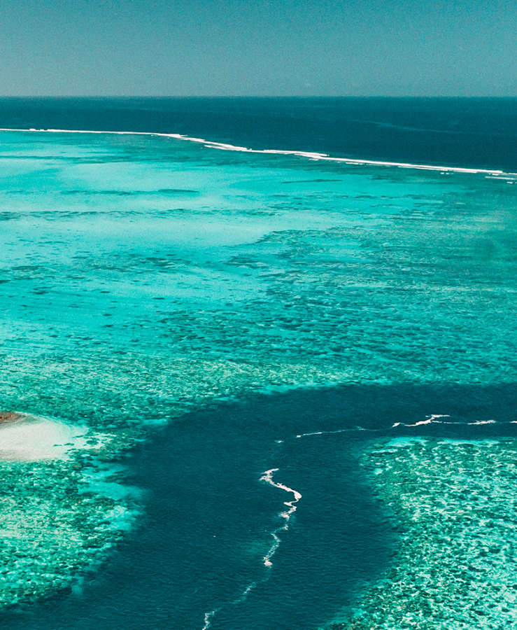 Aerial shot of aqua reef Brosse Islet, New Caledonia