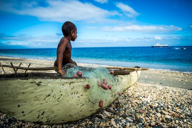 Boy on fishing boat