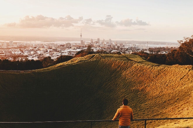 Man watching sunset in Mount Eden