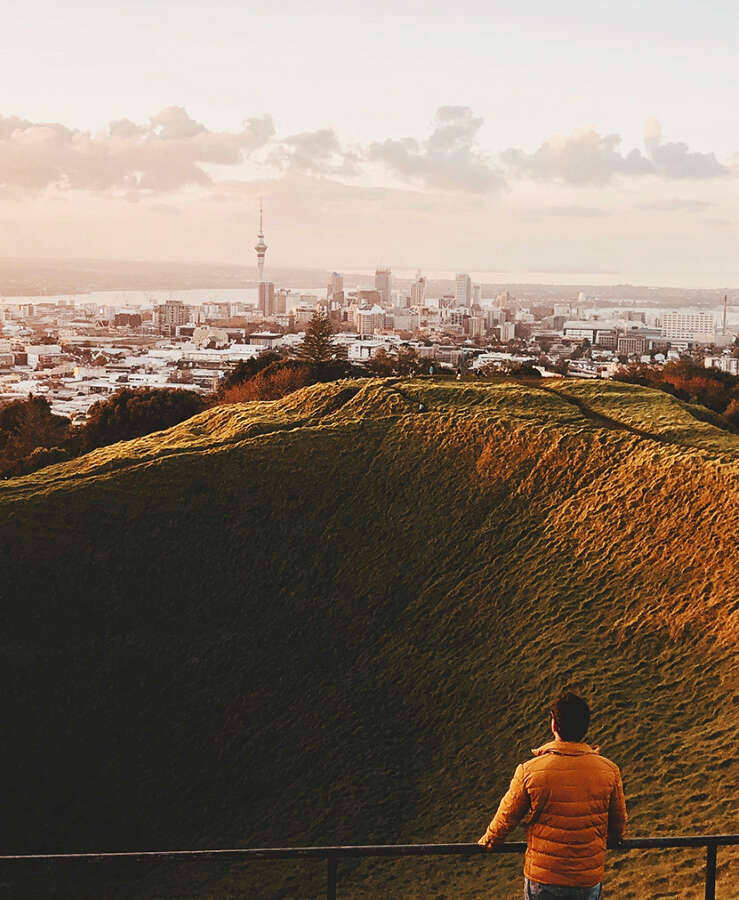 Man watching sunset in Mount Eden