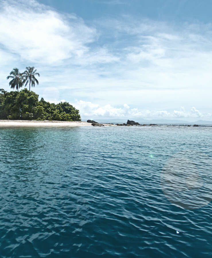 Small island on horizon, Tetepare, Solomon Islands