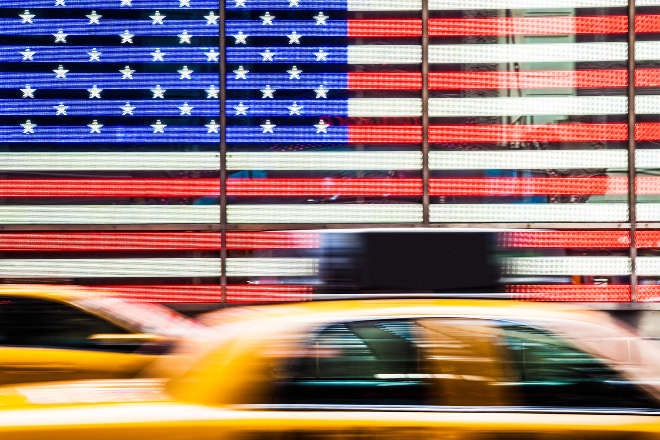 Yellow taxi and USA flag