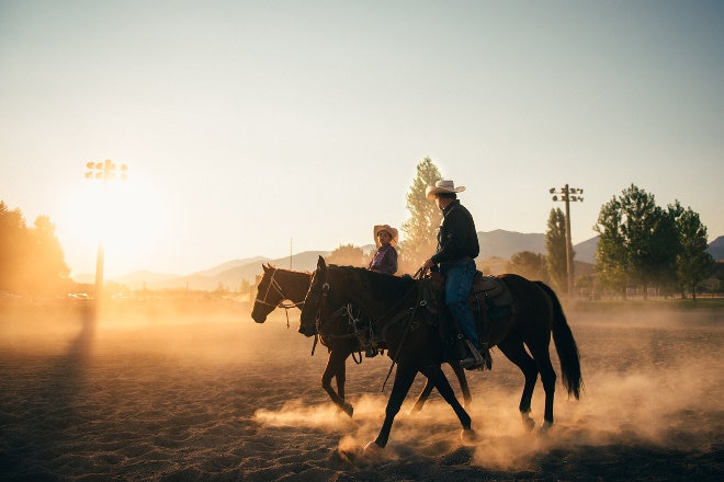 Cowboys at Rodeo on horses