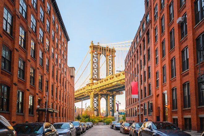 Brooklyn Bridge between two buildings