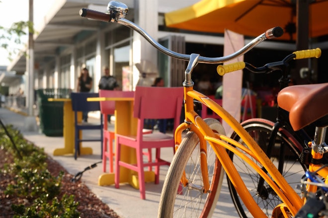 Yellow bike parked outside South Beach cafe