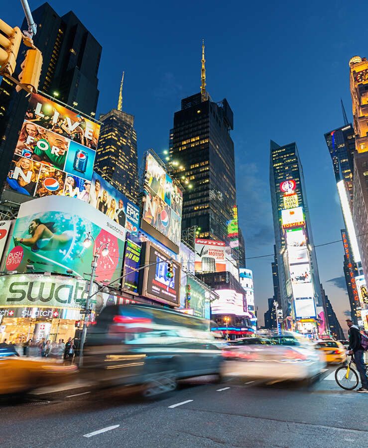 Times Square with people and traffic. New York City, USA.