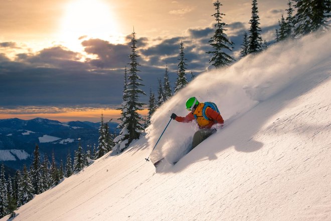 Man skiing down mountain 