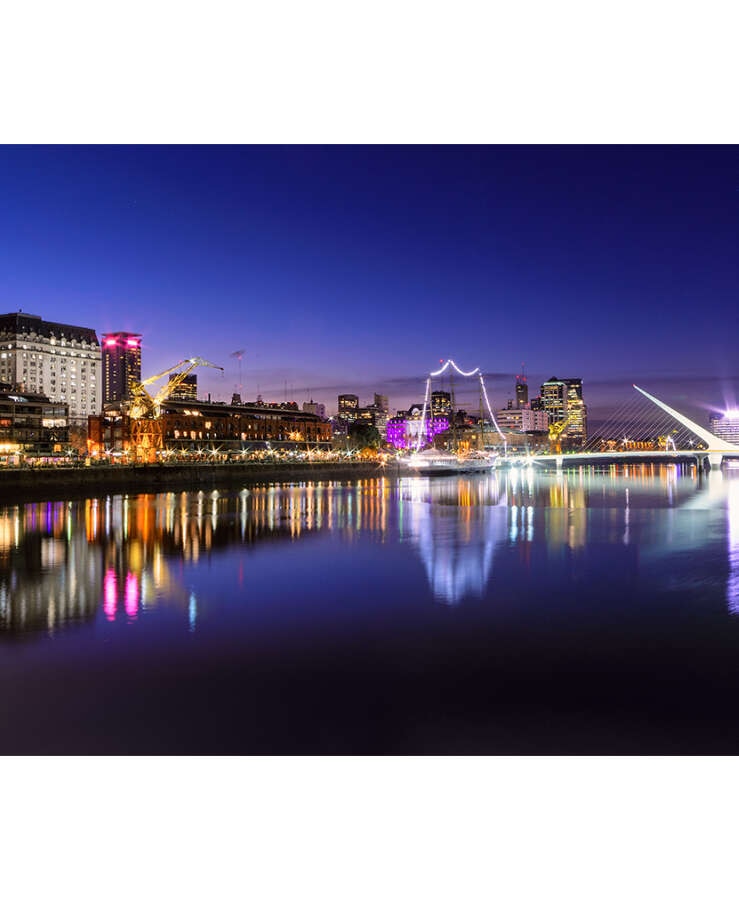 View Of Puerto Madero Against Clear Sky At Dusk