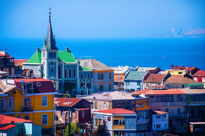 Coloured pink houses and blue skyline