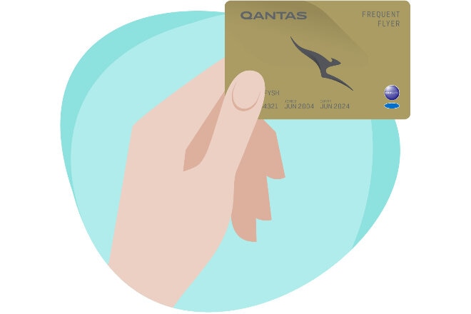 Handing holding a Qantas Frequent Flyer Gold card