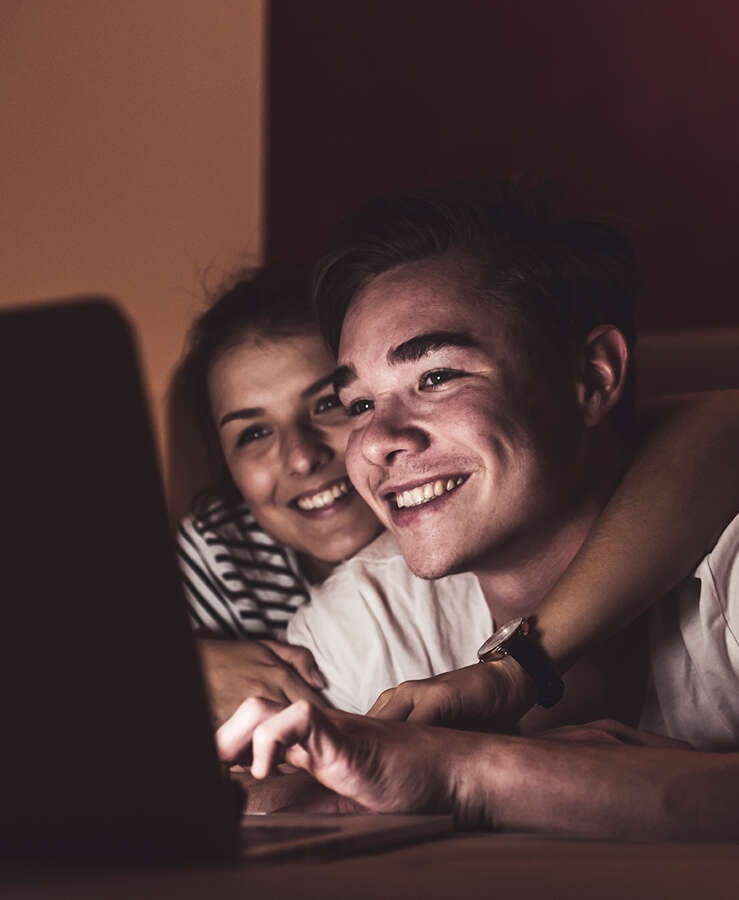 Couple looking at computer