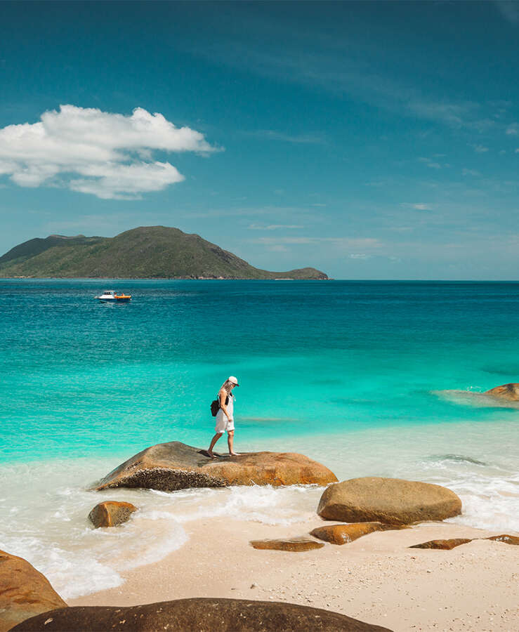 Woman at Nudey Bach, Fitzroy Island