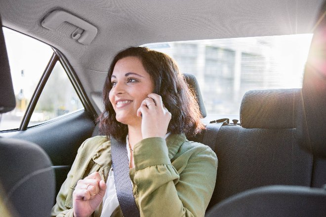 Lady in Uber on phone