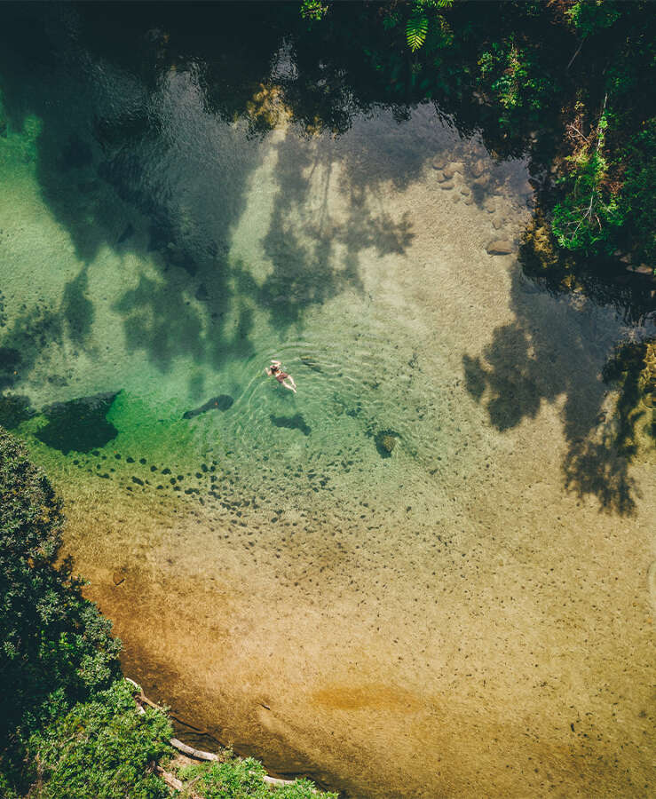 Aerial view of person swimming, Mission Beach, Queensland, Australia