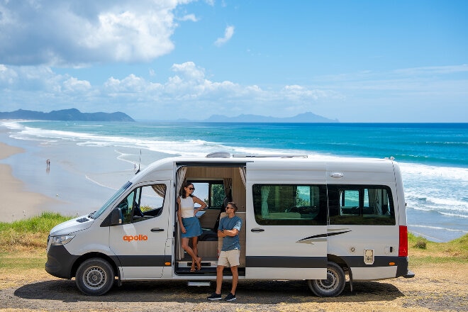 Apollo campervan parked overlooking a beach